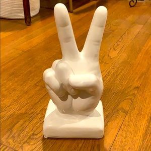 Peace sign ceramic statue
